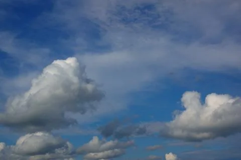 Blue sky background with white clouds Stock Photos