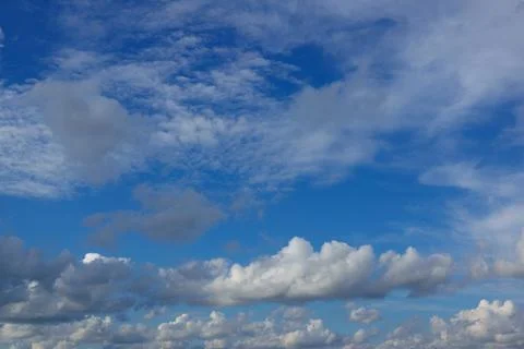 Blue sky background with white clouds Stock Photos