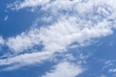 Blue sky background with white clouds Stock Photos