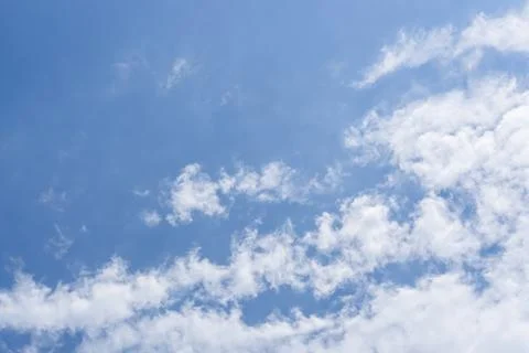 Blue sky background with white clouds Stock Photos
