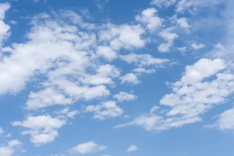 Blue sky background with white clouds Stock Photos