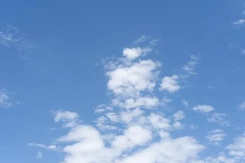 Blue sky background with white clouds Stock Photos