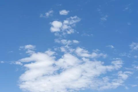 Blue sky background with white clouds Stock Photos