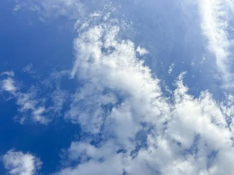 Blue sky background with white clouds Stock Photos