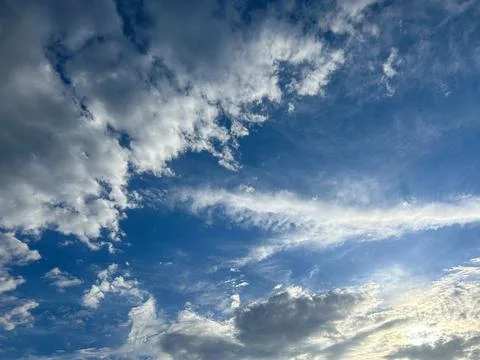 Blue sky background with white clouds Stock Photos
