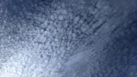 Blue sky background with white cloudsbe used as a background Stock Photos