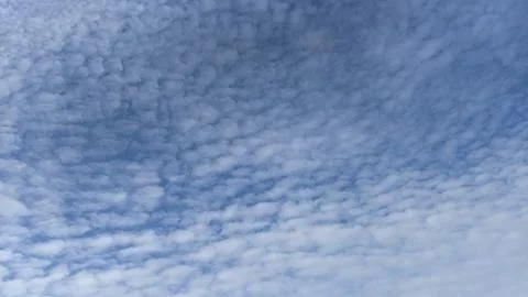 Blue sky background with white cloudsbe used as a background Stock Photos