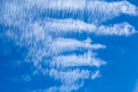 Blue sky with beautiful cloud formations Stock Photos