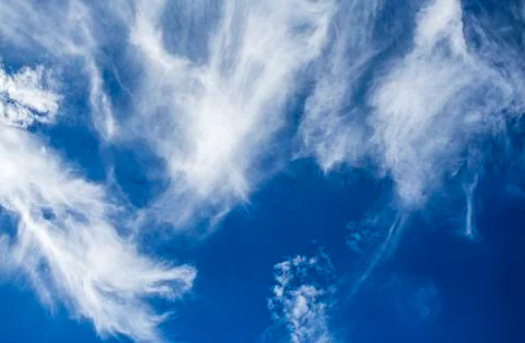 Blue sky with beautiful cloud formations Stock Photos