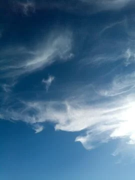 Blue sky with beautiful clouds during a sunny morning Stock Photos