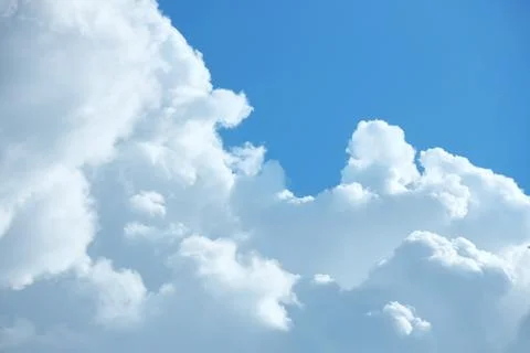 Blue sky with beautiful fluffy clouds Stock Photos