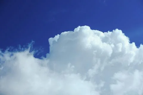 Blue sky with beautiful fluffy clouds Stock Photos