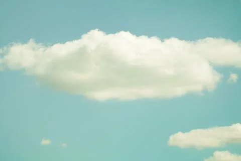 A blue sky with beautiful large cloud on a sunny day. Stock Photos