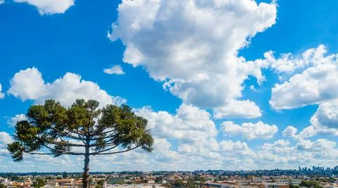Blue sky between white clouds Stock Photos