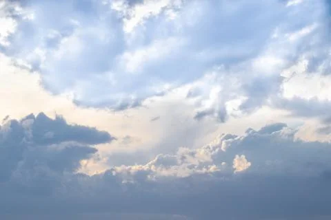 Blue sky with big clouds after a thunderstorm. The sky with clouds. Stock Photos