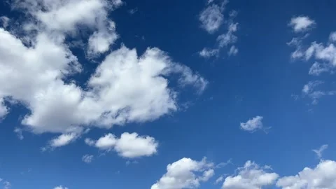 Blue sky big white clouds. Puffy fluffy clouds. Cumulus cloud cloudscape Stock Footage 272623599
