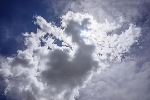 Blue sky with bright white clouds Stock Photos