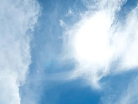 Blue sky, cloud and sun on blachground Stock Photos