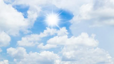 Blue sky with cloud and sunlight Stock Photos