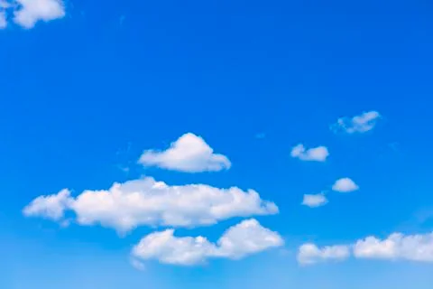 Blue sky with cloud background. With copy space for text or design. Stock Photos