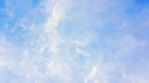 Blue sky with a cloud for a background. Stock Photos