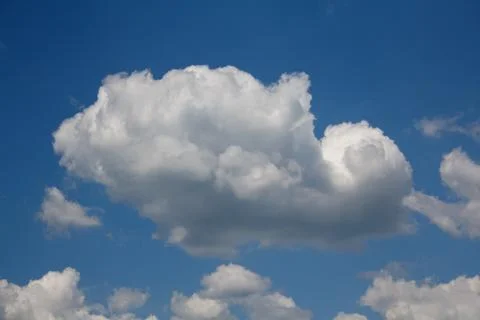 Blue sky with a cloud closeup. Nature Stock Photos