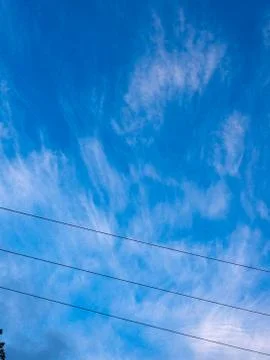 Blue sky cloud electric lines background design element Stock Photos