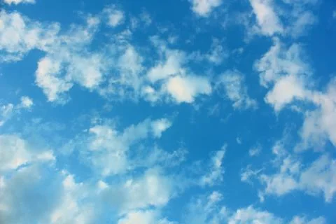 Blue sky with cloud patterns Stock Photos