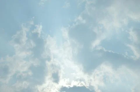 Blue sky with a cloud. Stock Photos