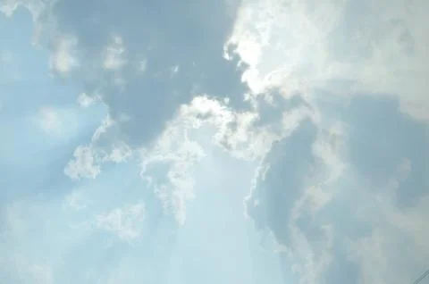 Blue sky with a cloud. Stock Photos