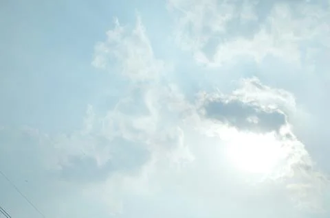 Blue sky with a cloud. Stock Photos