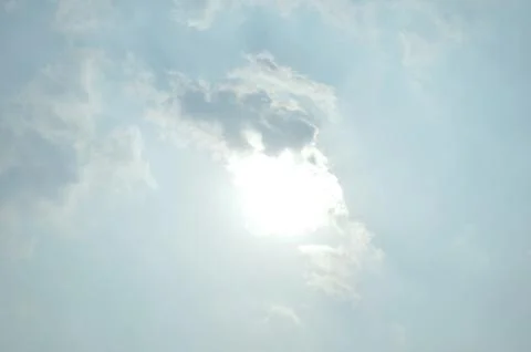 Blue sky with a cloud. Stock Photos
