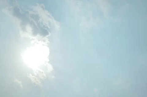 Blue sky with a cloud. Stock Photos