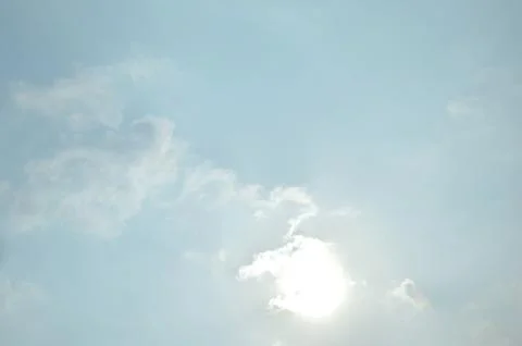 Blue sky with a cloud. Stock Photos
