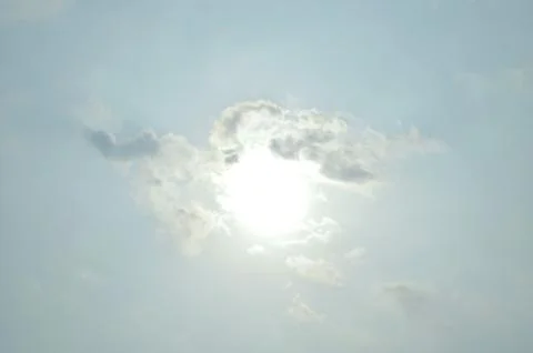 Blue sky with a cloud. Stock Photos