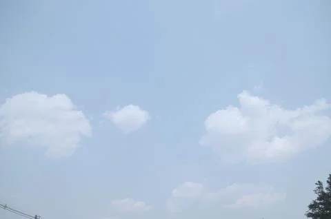 Blue sky with a cloud. Stock Photos