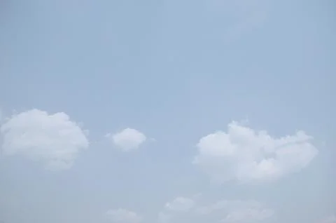 Blue sky with a cloud. Stock Photos