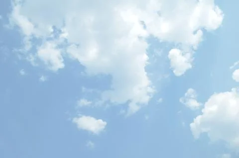 Blue sky with a cloud. Stock Photos