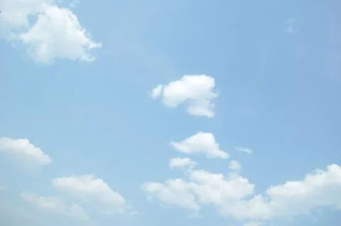Blue sky with a cloud. Stock Photos