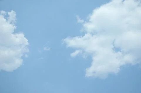 Blue sky with a cloud. Stock Photos