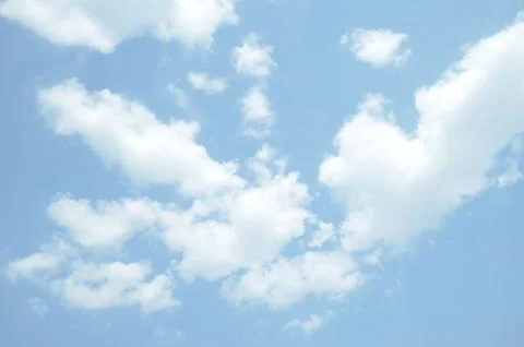 Blue sky with a cloud. Stock Photos