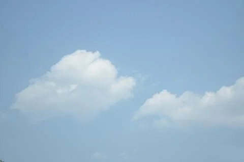 Blue sky with a cloud. Stock Photos