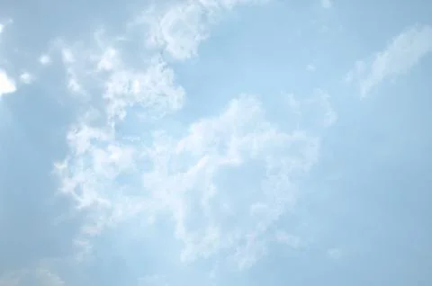Blue sky with a cloud. Stock Photos