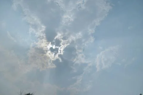 Blue sky with a cloud. Stock Photos