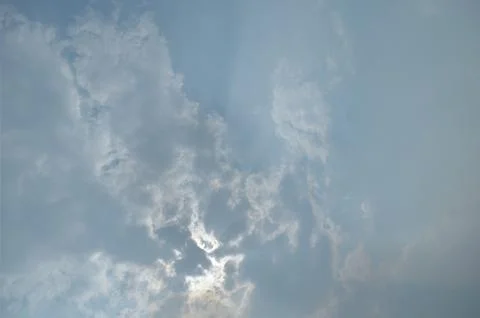 Blue sky with a cloud. Stock Photos