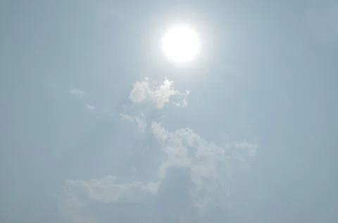 Blue sky with a cloud. Stock Photos