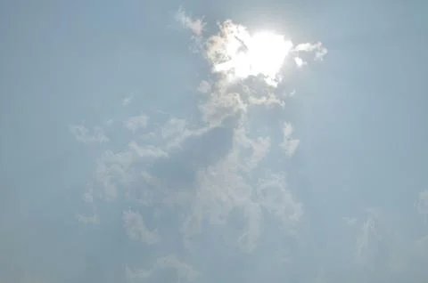 Blue sky with a cloud. Stock Photos