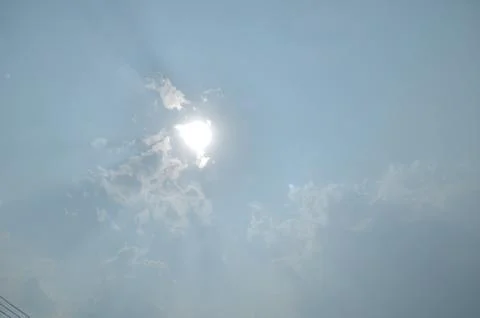 Blue sky with a cloud. Stock Photos