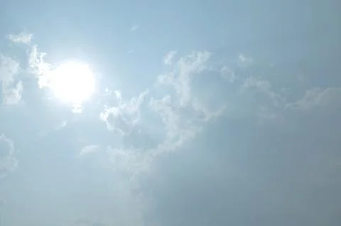Blue sky with a cloud. Stock Photos