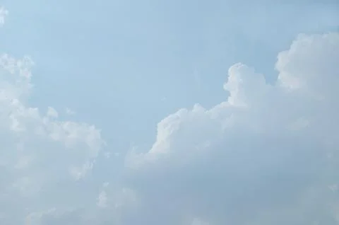 Blue sky with a cloud. Stock Photos